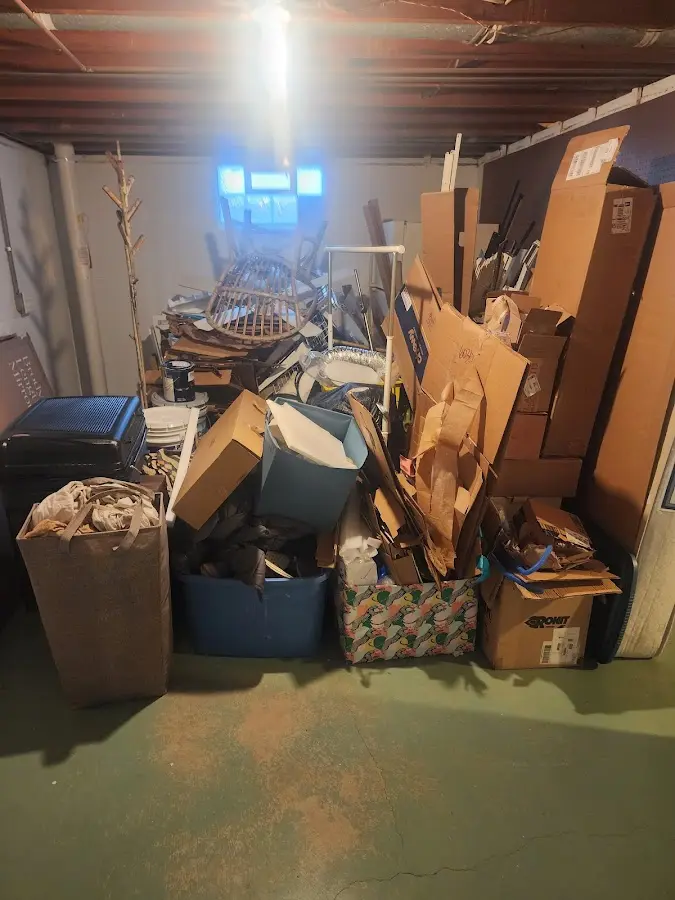 Roll-off dumpster container at job site for 2 Yard Dumpster Rental in Erie